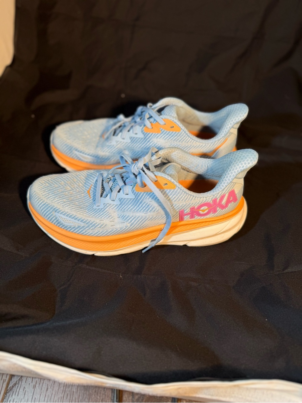 Hoka Women’s Clifton 9 Light AiryBlue with Orange Accents Athletic Running Shoes - Picture 2 of 7